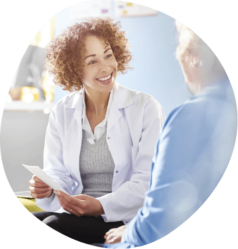 Person talking to medical professional about insomnia treatment