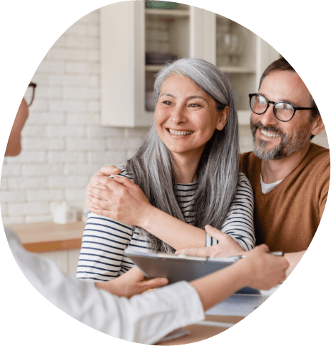 Older man and woman learning how medical insurance works