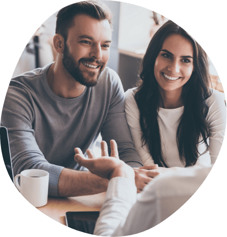 Man and woman talking to sleep center team member