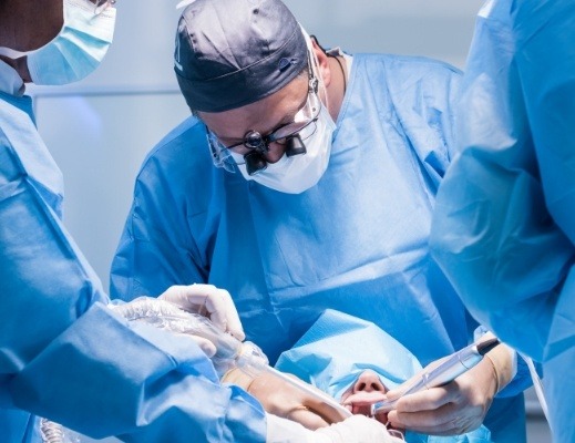 Sleep specialists operating on a patient