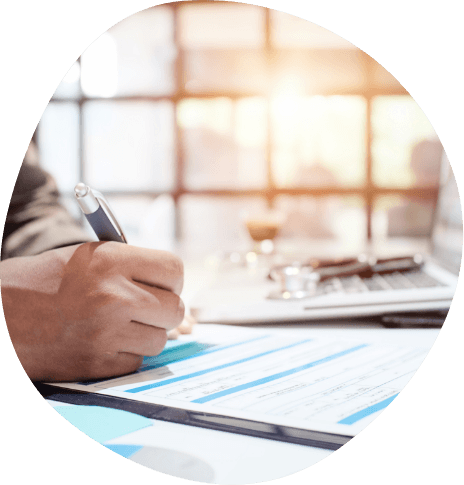 Person filling out form on clipboard