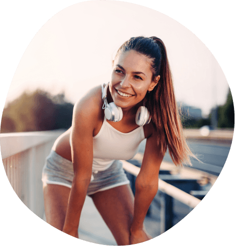 Woman catching her breath while walking outdoors