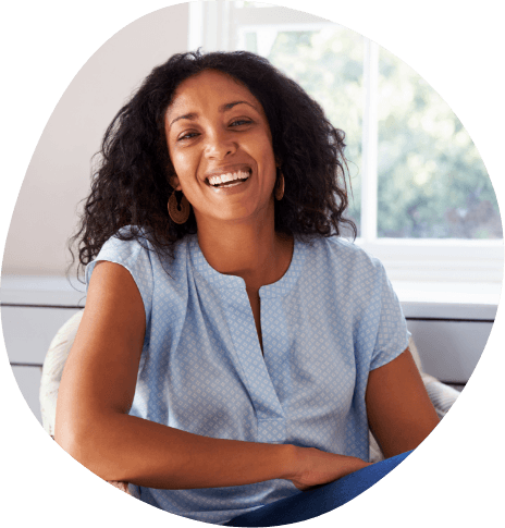 Smiling woman in light blue blouse