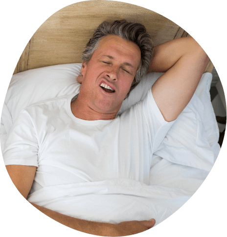 Man sleeping on his back with his mouth open